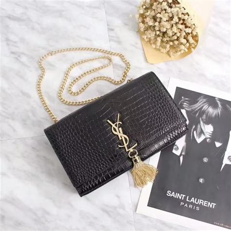 ysl kate leather clutch|YSL clutch bag with tassel.